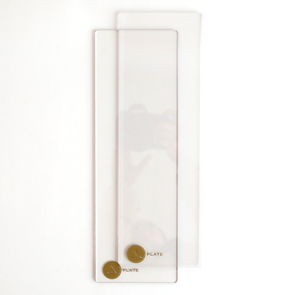 The Empress Mini 13" Full Plate Set includes two rectangular transparent acrylic plates with rounded corners and gold "PLATE" labels, displayed on a white surface—perfect replacement plates for your Empress Mini Machine die cutting projects.