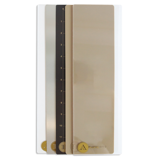 Four rectangular color sample cards labeled I, E, C, and A are stacked vertically in shades from black to beige, resembling the Empress Mini 13" Full Plate Set die cutting plates.