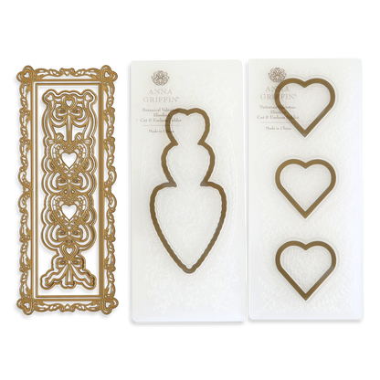 Slimline Hearts Dies and Cut Emboss Folders featuring heart-shaped and ornate rectangular metal dies on white packaging, labeled with Anna Griffin branding.