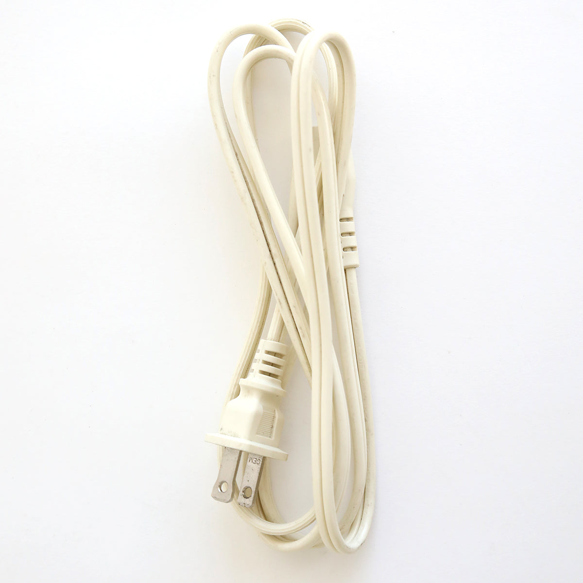 A coiled white two-prong power cord, perfect as a replacement for your Empress Elite Machine with Large and 13" Plates, shown against a plain white background.