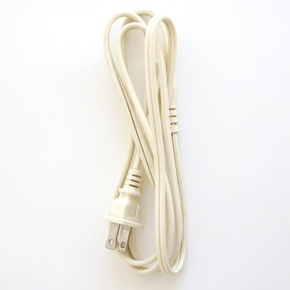 A coiled white two-prong power cord, perfect as a replacement for your Empress Elite Machine with Large and 13" Plates, shown against a plain white background.