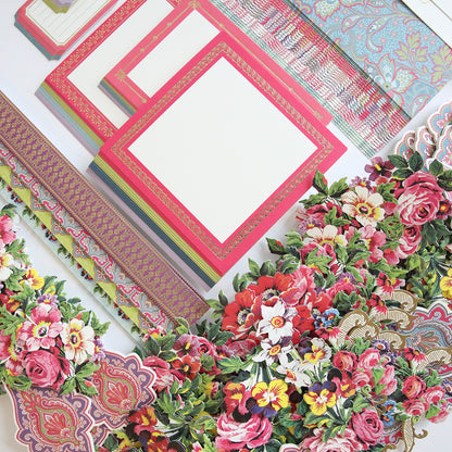 Explore our Paisley Papers and Embellishments collection, showcasing floral print stationery and decorative borders in vibrant shades of pink, red, and green with intricate designs. Ideal for adding an elegant touch to your scrapbook pages or enhancing your creative projects.