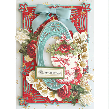 A detailed Christmas card featuring a red frame, blue bow, floral designs, and the words "Merry Christmas" on a rectangular label crafted with festive Christmas Double Sided 300gsm Cardstock.
