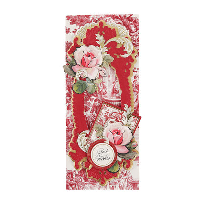 Greeting card crafted from Toile Doublesided 300gsm Cardstock, featuring pink roses, ornate red and gold cutouts made with Perfume Box Dies, and a “Best Wishes” label on a patterned background for an elegant finish.