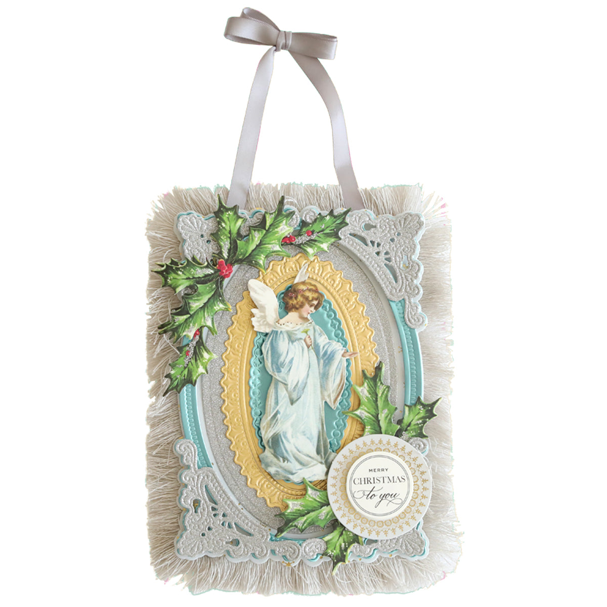 A decorative card with an angel illustration surrounded by holly leaves and berries, featuring holiday-inspired colors. The Christmas Perfect Palette Fringe is bordered with fringes and has a ribbon for hanging, with a festive message on the bottom right corner.