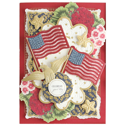 Introducing the Celebration Chest Craft Box Card Kit: a patriotic-themed card featuring American flags, a golden eagle, and floral patterns, all enhanced with foil embellishments for that extra shine. At the heart of this star-studded creation is the "Celebrate your day" message, perfect for crafters seeking unique supplies.