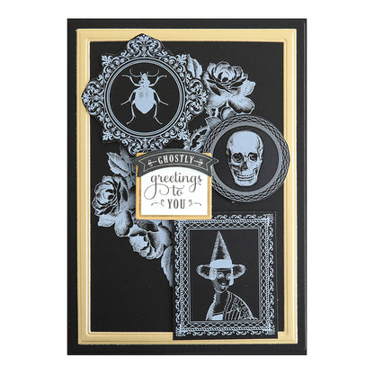 Perfectly Scary Halloween Embellishments: a black and gold card with vintage beetle, skull, witch, roses, and “Ghostly greetings to you”—perfect for Halloween projects.