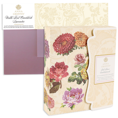 Fall Florals and Foil Bundles featuring a stack of lavender matte foil cardstock and a boxed set of three-dimensional autumn-colored dahlia and rose paper embellishments.