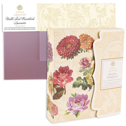 Fall Florals and Foil Bundles featuring a stack of lavender matte foil cardstock and a boxed set of three-dimensional autumn-colored dahlia and rose paper embellishments.