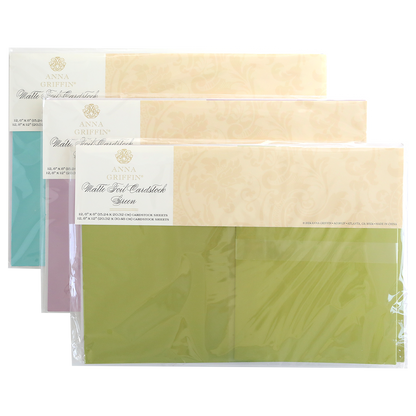 A Set of 3 Luxury Matte Foil Cardstock in lavender, blue, and green—ideal for embossing or die-cutting—is neatly stacked and sealed in clear plastic packaging.