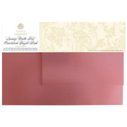 The Luxury Matte Foil Cardstock in Bright Pink features a floral-patterned package that inspires creativity, with two exquisite sheets ideal for elevating die-cutting projects.