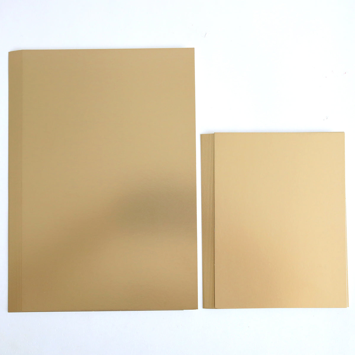 Two standing Luxury Matte Foil Cardstock Champagne boxes, one larger and one smaller, against a plain white background.