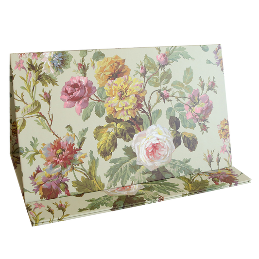 The Magnetic Die Stand Francesca features a floral pattern with vibrant flowers and green leaves on a light background—perfect for adding decorative charm and practical organization to your craft room.