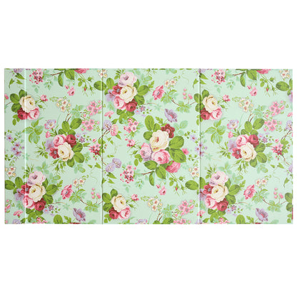 The Magnetic Die Stand Amelie is a three-panel decorative screen with a floral pattern on a green background, showcasing pink, white, and purple flowers along with green leaves. This stand is ideal for crafting spaces, offering both beauty and organization to your room.