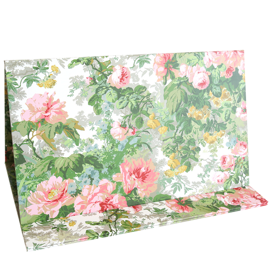 A stylish folding screen named the Magnetic Die Stand Virginia, featuring a charming floral pattern with pink, green, and yellow flowers on a pristine white background, is perfect for enhancing your crafting space.