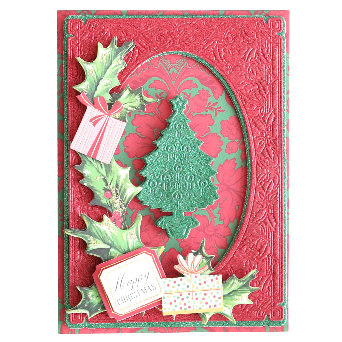 A luxurious Christmas card crafted from glittery cardstock, adorned with a raised green and red design that showcases a Christmas tree, holly leaves, and presents. The card features "Happy Christmas" elegantly written on a gift tag at the bottom.