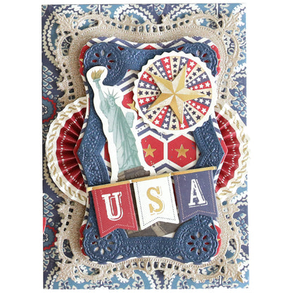 A decorative card made with Luxury Glitter Cardstock featuring the Statue of Liberty, a star, patriotic patterns, and a "USA" banner on a blue and red background for an elegant, eye-catching look.
