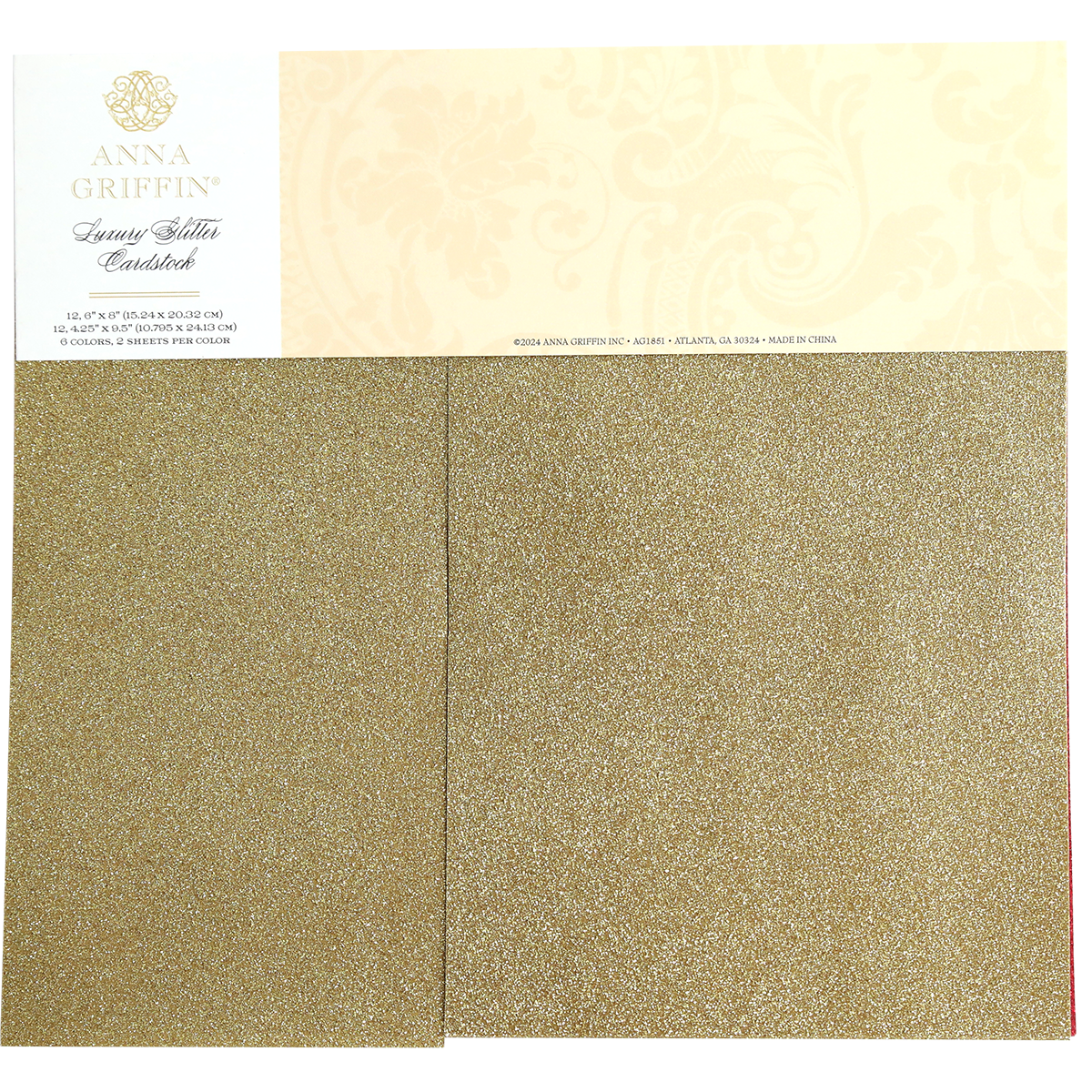 A package of Luxury Glitter Cardstock by Anna Griffin, featuring 12 sheets of gold glitter paper.