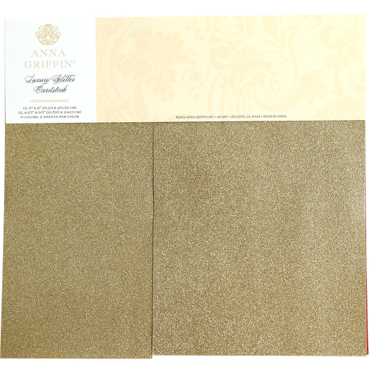 A package of Luxury Glitter Cardstock by Anna Griffin, featuring 12 sheets of gold glitter paper.