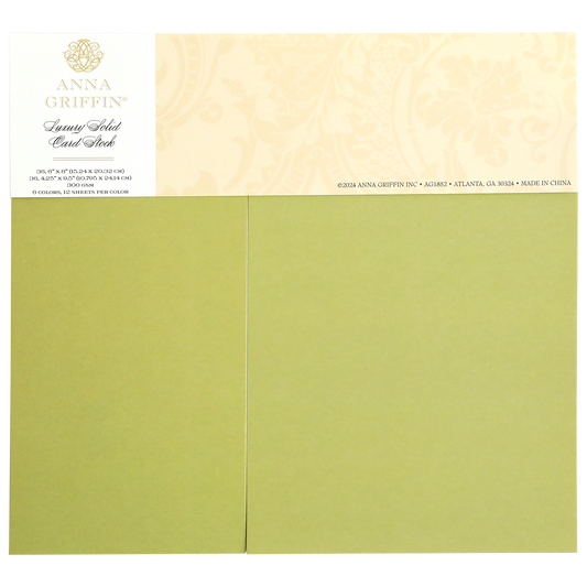 This set of Anna Griffin Luxury Solid Cardstock, crafted in olive green, is ideal for die-cutting and embossing. Each pack contains 54 sheets, measuring 5"x7", and is made in China.