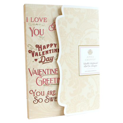 The Smitten Sentiments Rub On Transfers decorative Valentine's Day card showcases "I Love You," "Happy Valentine's Day," and "You Are So Sweet" in different fonts, adorned with elegant embellishments. Its beige floral pattern offers a lovely backdrop, evoking the charm of rub-on transfers.