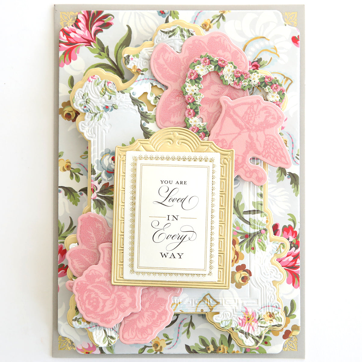 A decorative card showcases floral patterns and pink embellishments, with a central message: "You Are Loved In Every Way" in elegant script, beautifully accentuated by the Smitten Hybrid Ink Palette.