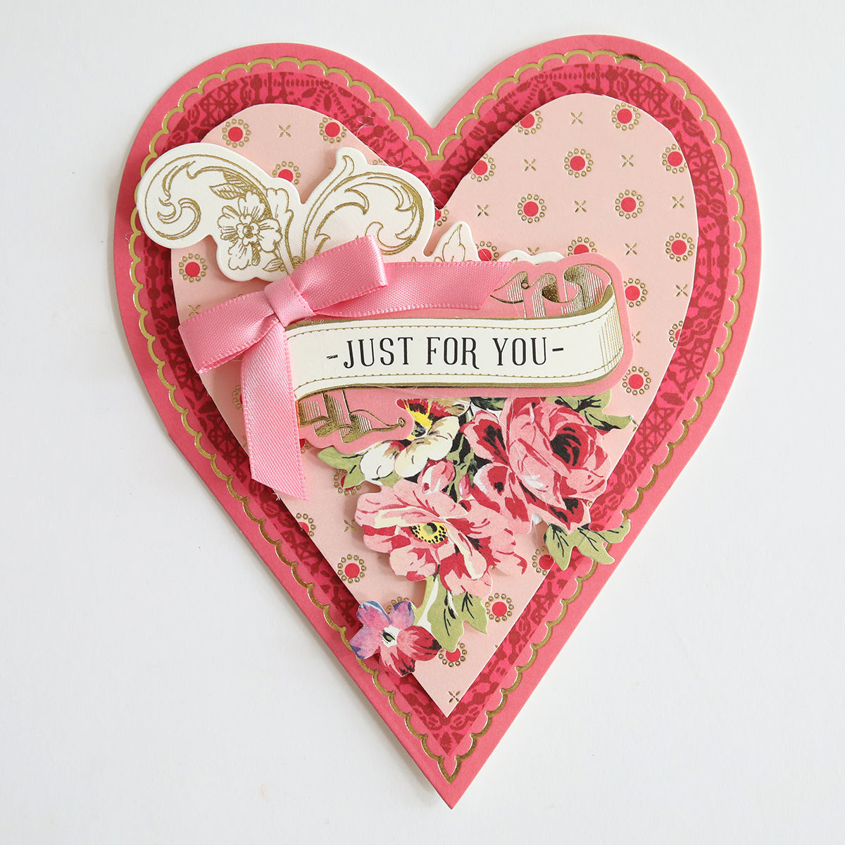 The Heart Shaped Cards with Envelopes 36 count features elegant, ornate floral designs layered on a heart-shaped card adorned with a pink bow, nestled inside vellum envelopes. The front displays "Just For You" on a central banner, with the interior left blank for personalized messages.