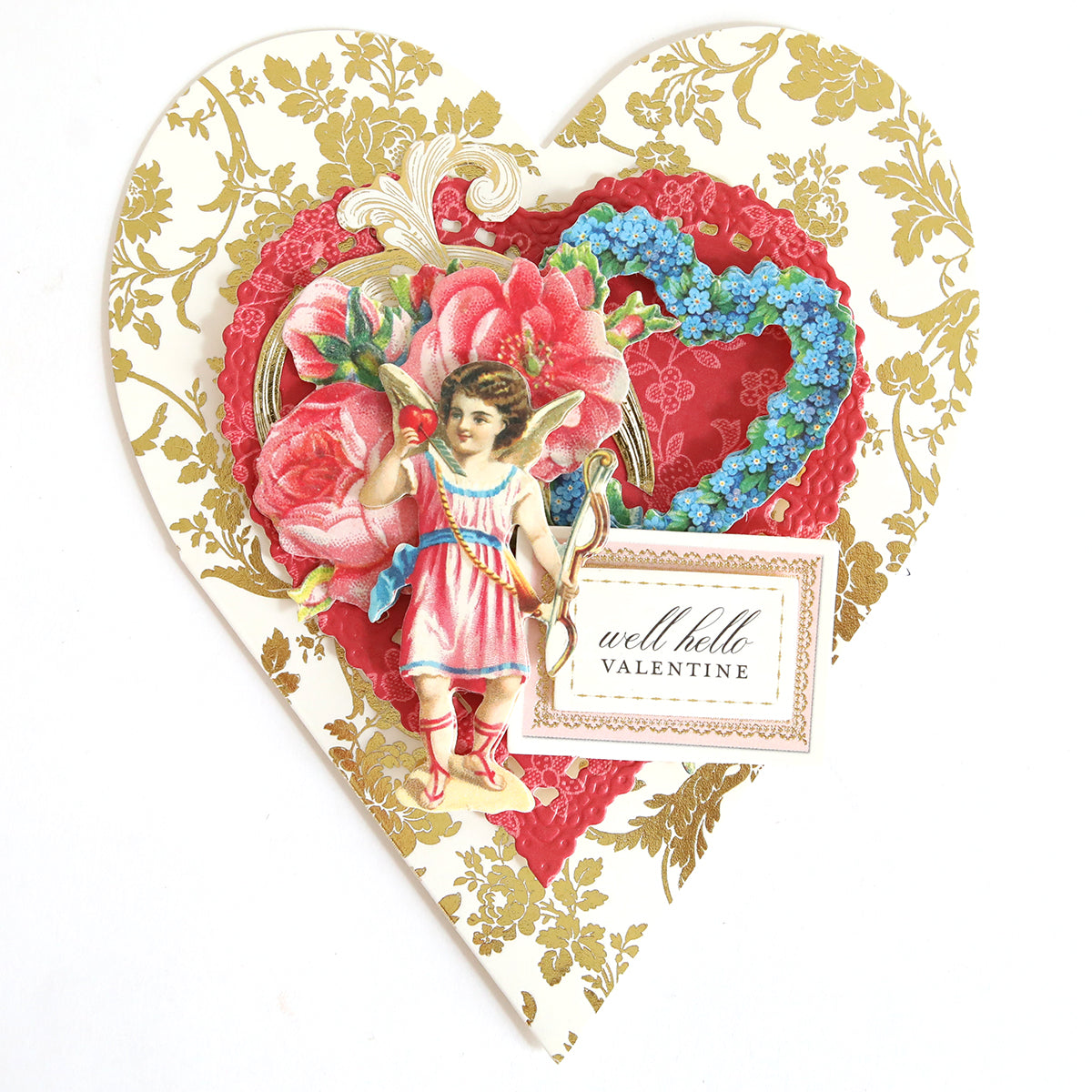 Heart-shaped card showcasing a heart design with floral motifs and a charming child illustration. The card includes the text “Well Hello Valentine” and is accompanied by a vellum envelope, ensuring its vintage charm is preserved and leaving the interior blank for your personal message.