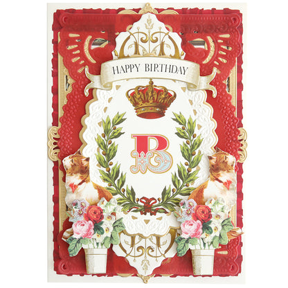Ornate birthday card featuring a large letter "B" made with Fancy Alphabet Rub On Transfers, a crown, two cats, florals, and a "Happy Birthday" banner on an elegant red and gold background—ideal for creative cardmaking.