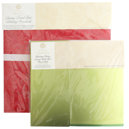 Two packs of Holiday Tonal and Matte Foil Cardstock—one red damask, one green ombre—are perfect for Christmas projects and come sealed in plastic packaging.