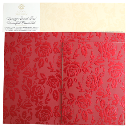 Luxury Tonal Foil Heartfelt Cardstock sheets feature a glossy embossed rose pattern in red and are elegantly packaged, adding a sophisticated touch to any craft project.