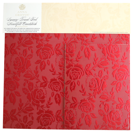 Luxury Tonal Foil Heartfelt Cardstock sheets feature a glossy embossed rose pattern in red and are elegantly packaged, adding a sophisticated touch to any craft project.