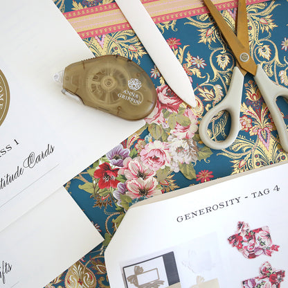 Create 2025 Instructions, featuring scissors, a paper folder, adhesive tape, printed cards, and decorative floral paper displayed with colorful photo inspiration for designing Fall 2025 floral crafts.