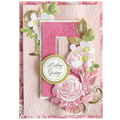 A decorative pink and gold birthday card showcases embossed florals, layered paper flowers, and a "Birthday Greetings" label, beautifully crafted using the Birthday Present Scroll 3D Concentric Frame Dies.
