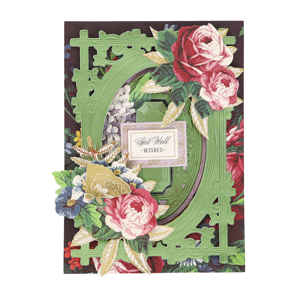 A decorative card, perfect for card making and other handmade projects, features pink and red roses, a green ornate frame created with the Woodland 3D Concentric Frame Dies, and a gold-bordered label that reads “Get Well Wishes” at the center.