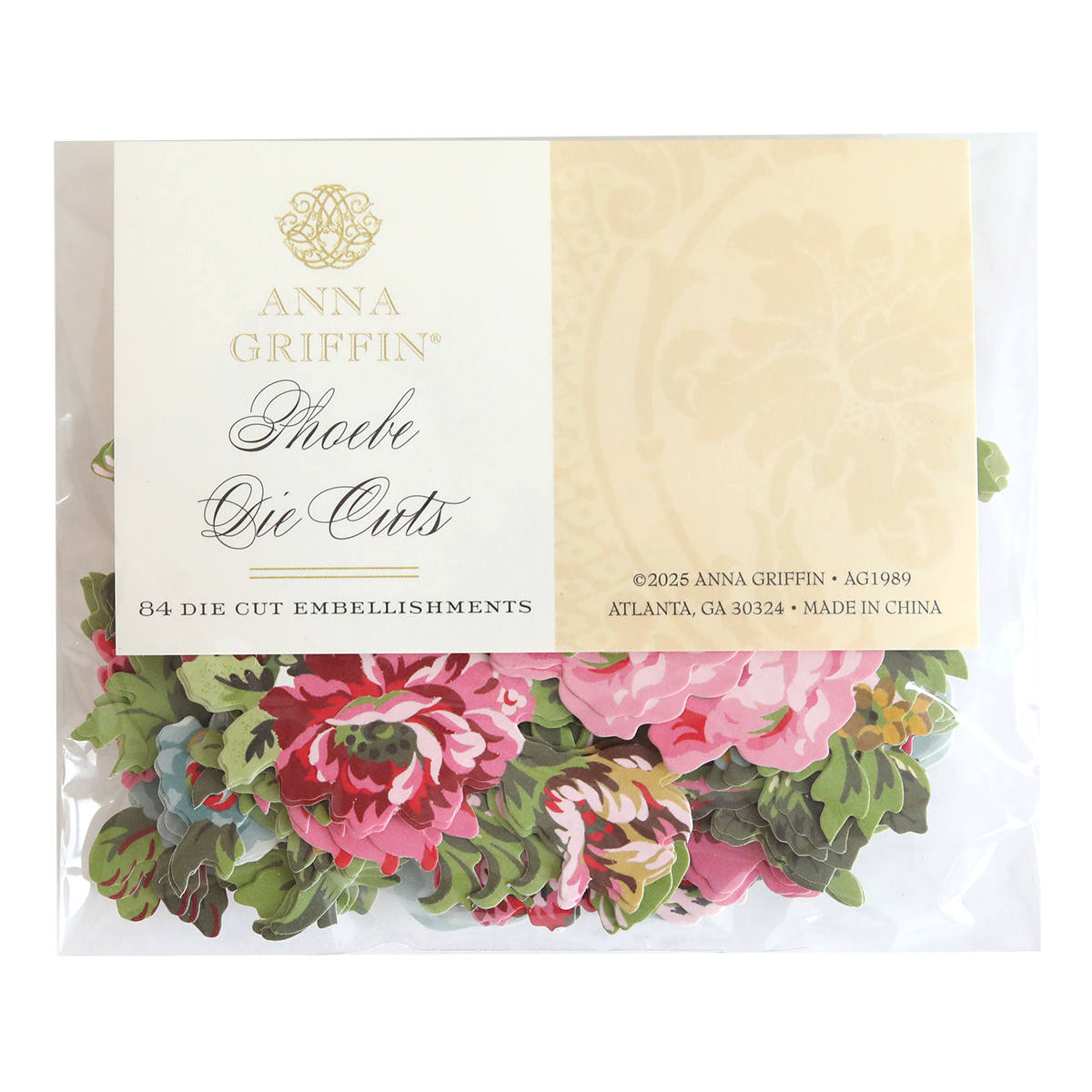 A pack of Phoebe Die Cut Embellishments featuring 84 floral scrapbook pieces in pink, green, and white.
