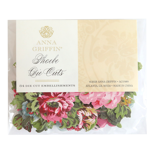 A pack of Phoebe Die Cut Embellishments featuring 84 floral scrapbook pieces in pink, green, and white.