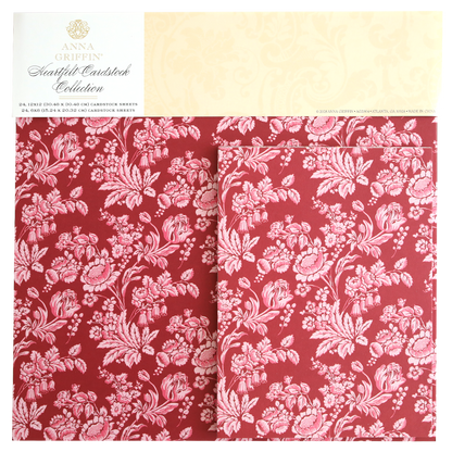 Heartfelt Cardstock features double-sided red sheets with a detailed white floral pattern, making it perfect for floral scrapbook paper projects.