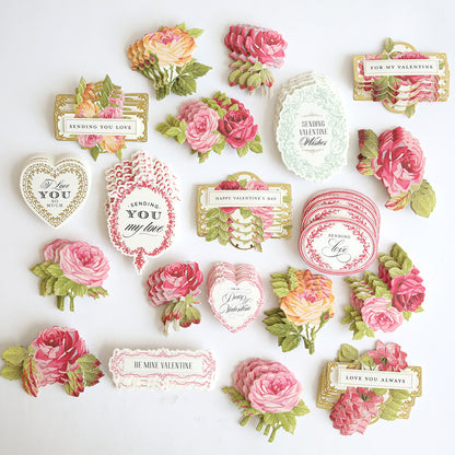 Heartfelt Stickers featuring sweet Valentine’s messages like “Sending You Love” and “Be Mine Valentine” are arranged on a white background with vintage-style cards and romantic floral designs.