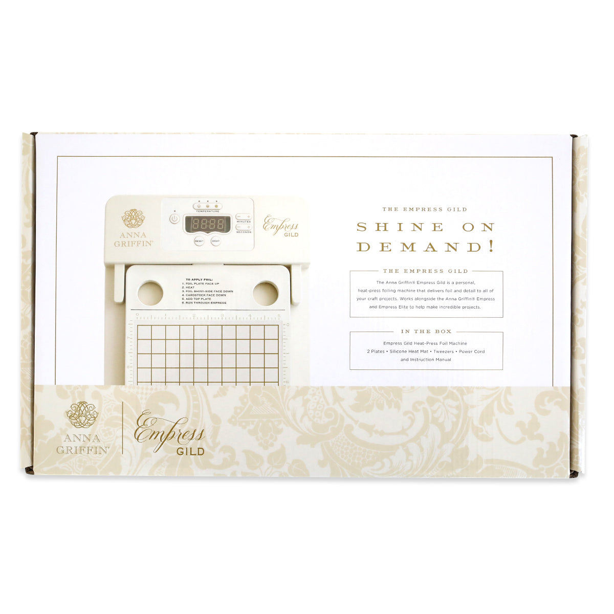 The Empress Gild Hot Foil Machine box showcases the device and lists included foils, magnetic plates, and Anna Griffin Hot Foil Plates on the front.