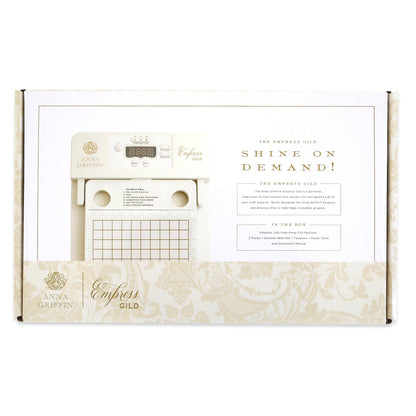 The Empress Gild Hot Foil Machine box showcases the device and lists included foils, magnetic plates, and Anna Griffin Hot Foil Plates on the front.