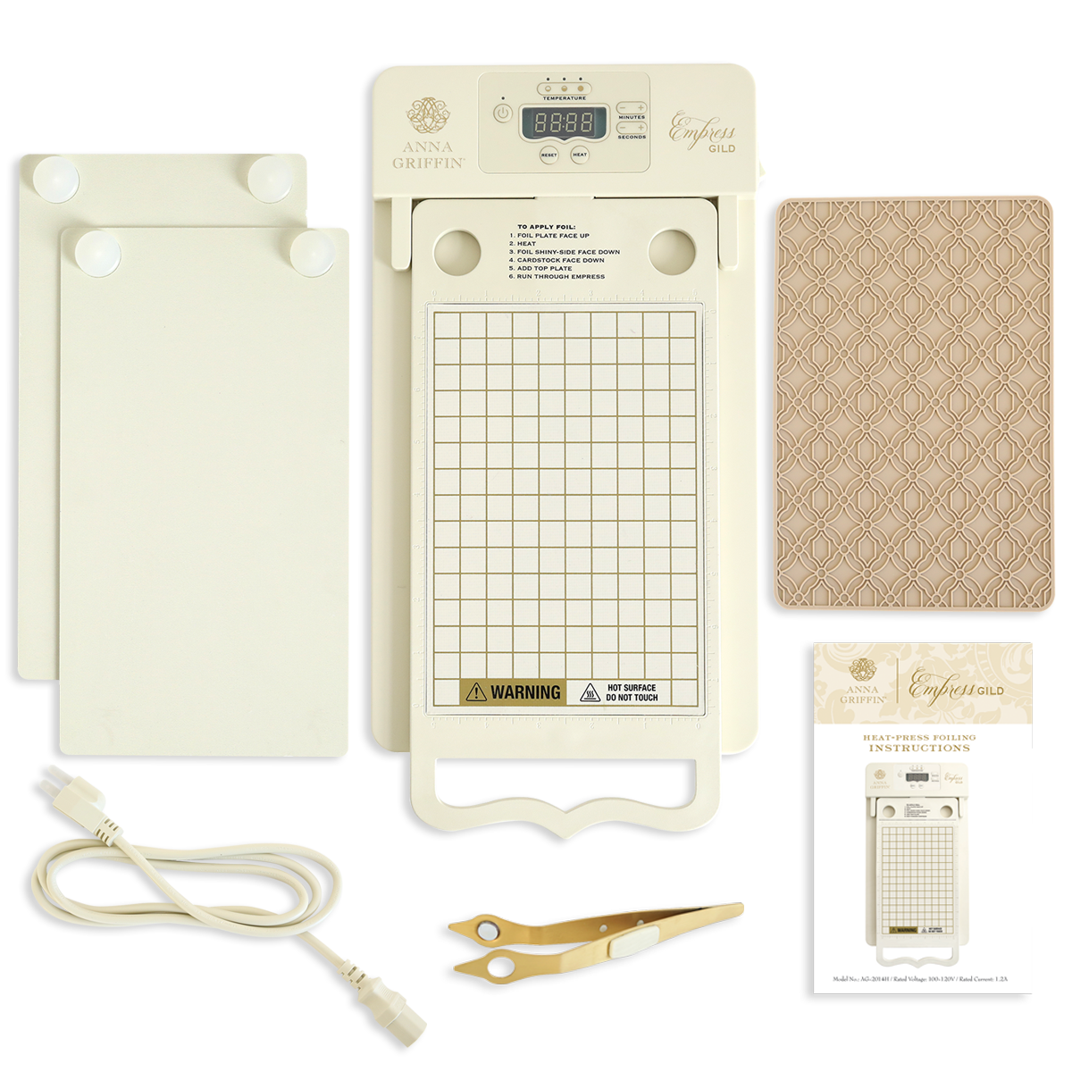 The Empress Gild Hot Foil Machine kit features a digital display, grid plate, spatula tool, power cord, two plates, patterned notebook, and instruction sheet, all arranged on a white background.