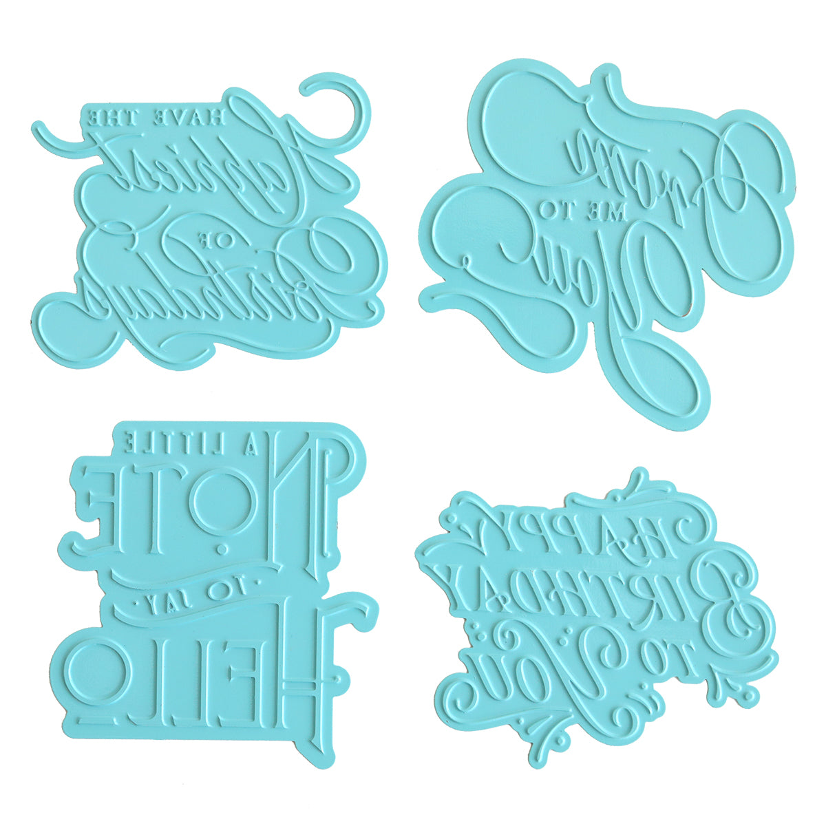 Four light blue plastic embossing stamps with reversed cursive and block text, ideal for decorating cakes or cookies and perfect for use before applying foil with the Empress Gild Hot Foil Starter Bundle.