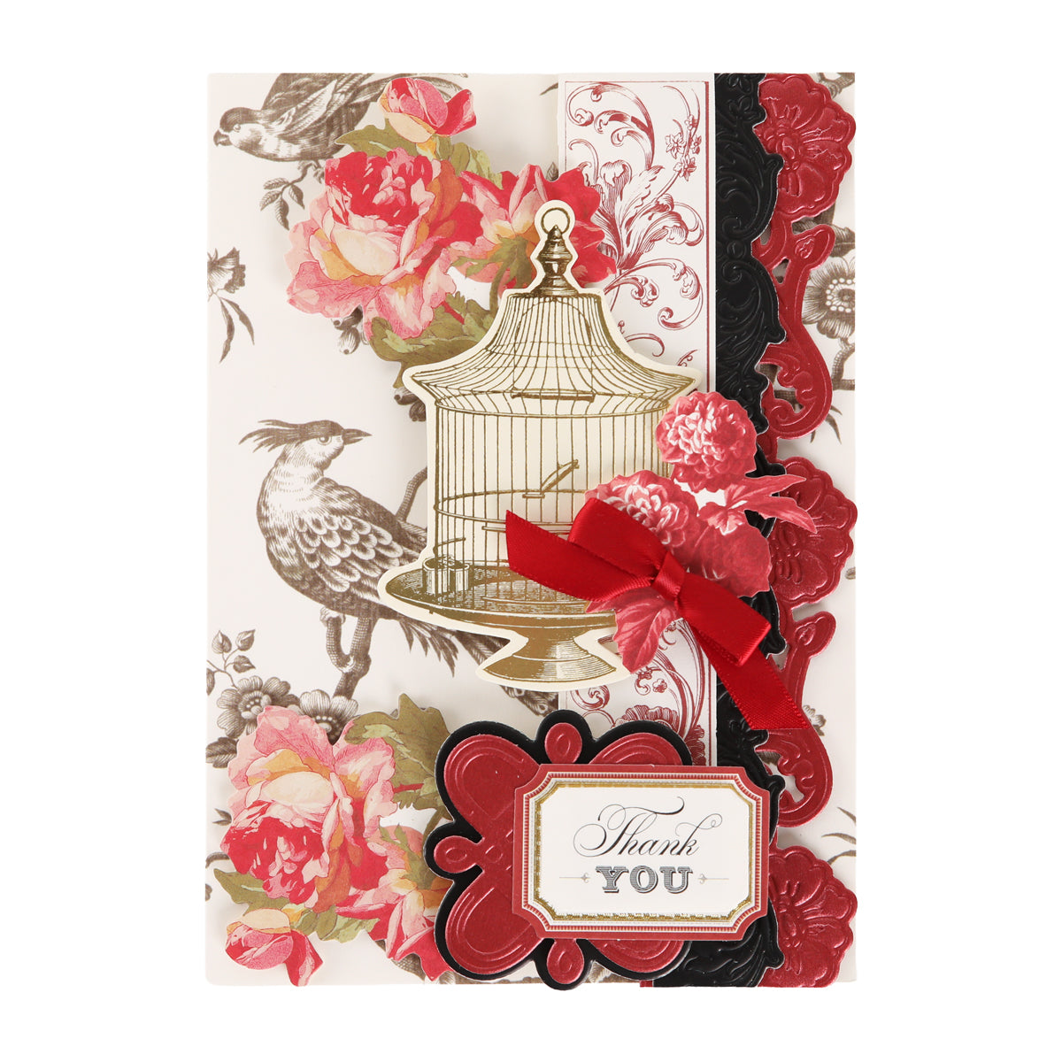 Greeting card featuring floral and bird motifs, a delicate birdcage illustration, and a red ribbon adorned with flowers, finished with a “Thank You” label in cursive at the bottom—ideal for vintage-style papercrafts and crafted using decorative dies from the Fleur Rouge Papercrafting Kit with Dies.