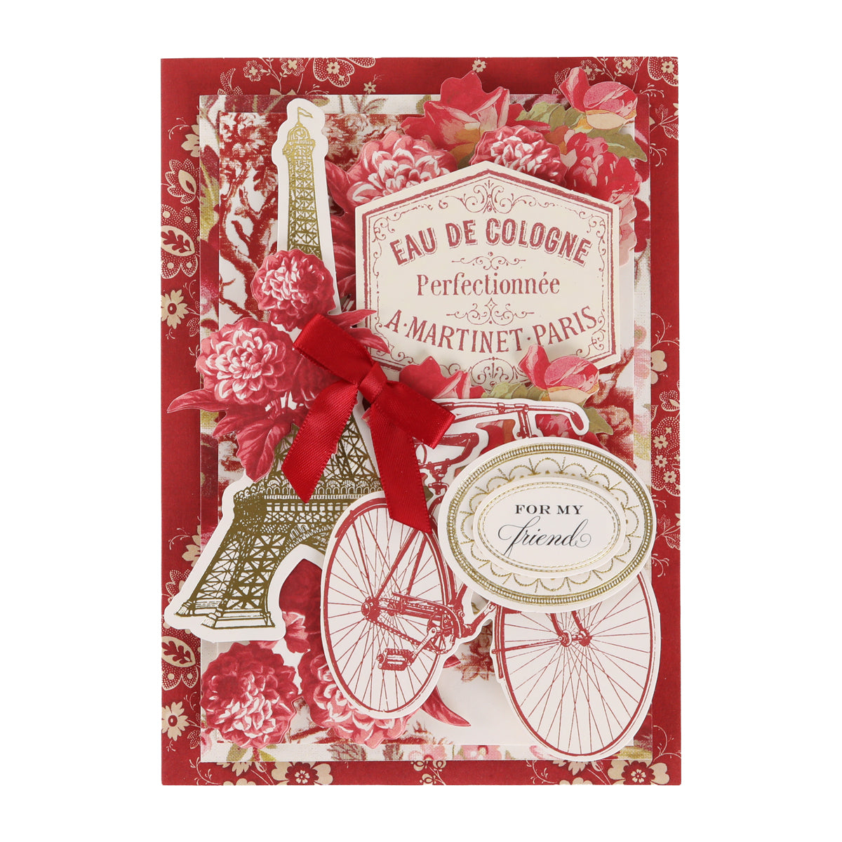 Crafted with vintage-inspired flair, the Fleur Rouge Papercrafting Kit with Dies features a greeting card adorned with red floral patterns, a classic red bow, charming images of the Eiffel Tower and a bicycle, plus labels reading “For My Friend” and “Eau de Cologne Perfectionnée A. Martinet Paris.” Ideal for papercraft enthusiasts, this delightful design is beautifully brought to life using the decorative dies included in the kit.