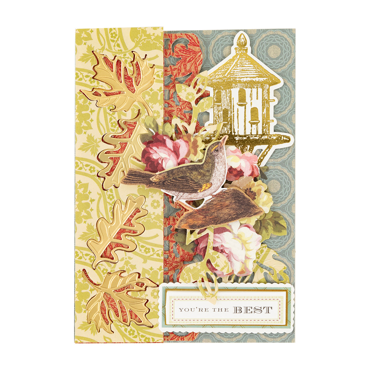 A handmade card created with the Haven Papercrafting Kit with Dies, featuring layered vintage papers, golden die-cut leaves, a bird on a perch, and a “YOU’RE THE BEST” sentiment label.