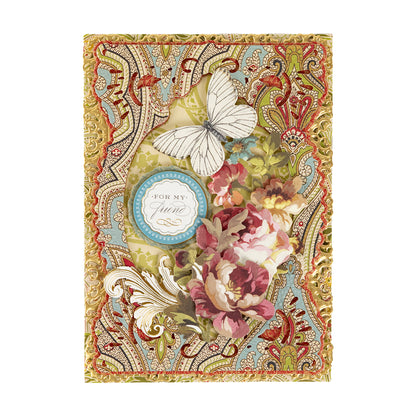 Handmade vintage card from the Haven Papercrafting Kit with Dies, featuring a cream floral background, a white butterfly, paper flowers, and a circular tag that reads “For my friend.”