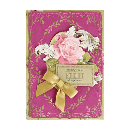 Introducing the Bright Fabric Card Layers—a beautiful decorative card featuring a pink floral background, elegant gold detailing, a prominent pink rose illustration, luxurious fabric card layers for added texture, a shimmering gold bow, and an uplifting plaque that reads “sending you a BOUQUET of happiness.” Perfect for card making or scrapbooking enthusiasts.