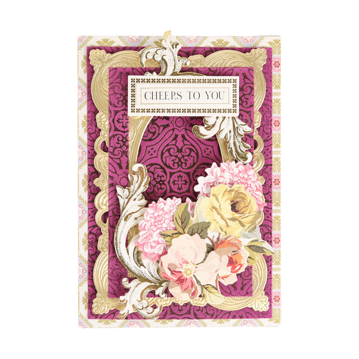 Ornate greeting card with a gold and pink embossed frame, featuring a floral bouquet at the bottom and a “CHEERS TO YOU” sign at the top center—perfect for card making or scrapbooking projects using Bright Fabric Card Layers to add a touch of luxury.