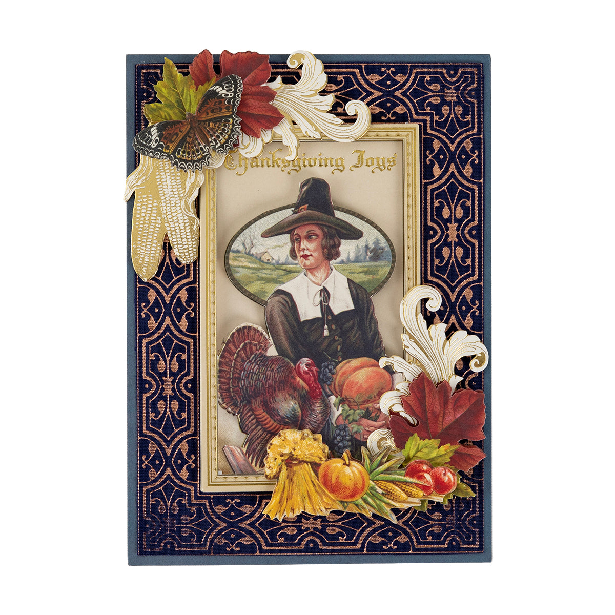 The Dark Fabric Card Layers 5″ x 7″ Thanksgiving card shows a Pilgrim woman, turkey, and “Thanksgiving Joys” on an ornate dark background.